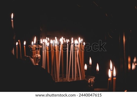 Greek Orthodox Christian Easter ceremony procession, divine worship service, worshippers hold candles, parishioners during an Easter vigil mass in a Cathedral, Athens, Attica, Greece, divine liturgy