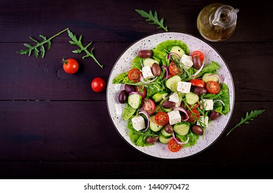 Greek Salad With Fresh Vegetables, Feta Cheese And Kalamata Olives. Healthy Food. Top View