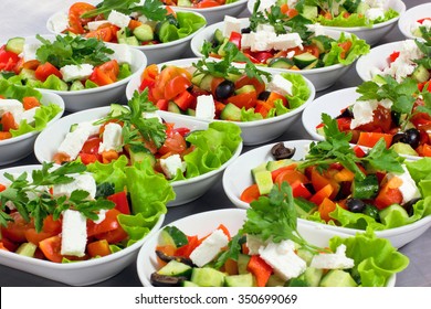 Greek Salad With Fresh Vegetables, Feta Cheese And Black Olives, Flight Catering, Aircraft, Food On Airplanes, Many Dishes With A Greek Salad.