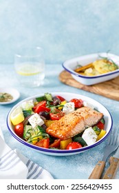 Greek salad with grilled salmon fish. Traditional mediterranean cuisine. Healthy food, diet - Shutterstock ID 2256429455