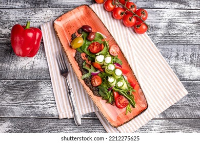 Greek Salad, Greek Salad On A White Background, Side And Top View