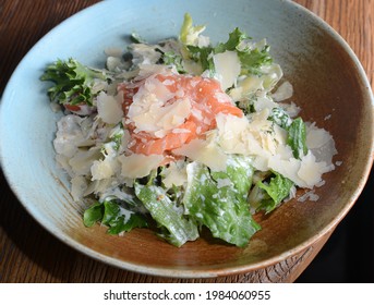 Greek Salad With Salmon. A Restaurant