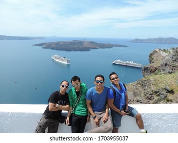 
Greek Santorini Cruise Ship Workers Are Spending Time Off By Traveling In The Greek City Of Santorini April 15, 2019