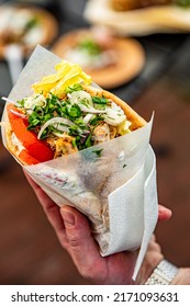 Greek Street Food Gyros In Man Hand Outdoor