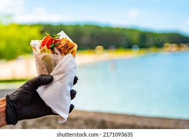 Greek Street Food Gyros In Man Hand Outdoor