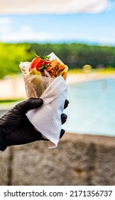 Greek Street Food Gyros In Man Hand Outdoor