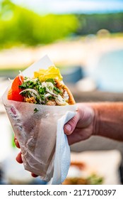 Greek Street Food Gyros In Man Hand Outdoor