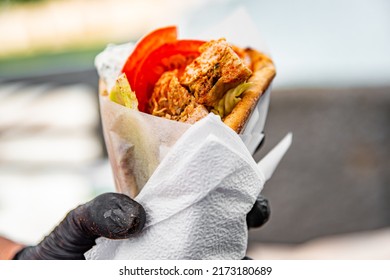 Greek Street Food Gyros In Man Hand Outdoor