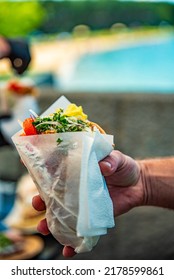 Greek Street Food Gyros In Man Hand Outdoor