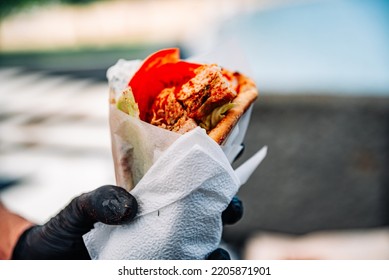 Greek Street Food Gyros In Man Hand Outdoor