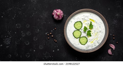 Greek Tzatziki Sauce On Black Stone Background. View From Above. Banner