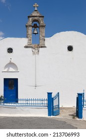 Greek white church in Komitades. Crete. Greece. Vertical - Shutterstock ID 213706993