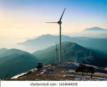 A Greek wind park on the snowed mountain, at Kithairon, Greece. Wind turbines with the sea in the background. - Powered by Shutterstock