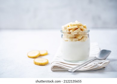 Greek Yogurt Banana Parfait In A Jar. Toning. Selective Focus