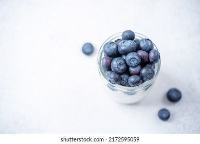 Greek Yogurt Blueberry Parfait In Jars. Toning. Selective Focus