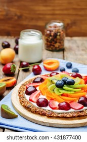 Greek Yogurt Granola Fruit Breakfast Pizza. Toning. Selective Focus