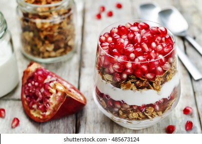 Greek yogurt granola Pomegranate parfait. toning. selective focus - Powered by Shutterstock