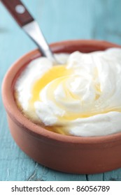 Greek Yogurt With Honey In A Pot