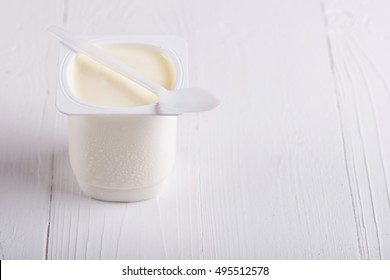 Greek Yogurt. Yogurt In White Plastic Cup. 