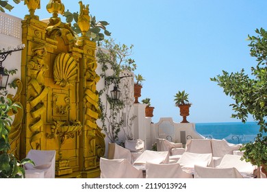 Greek-style Restaurant Overlooking The Sea Off The Amalfi Coast, Positano, Italy.