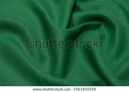 Green Abstract background. Green linen fabric texture, background. Green fabric.