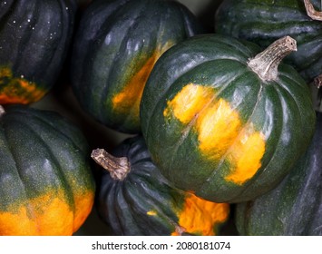 Green Acorn Winter Squash On Display At The Farmers Market, Close Up