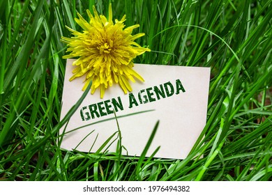 Green agenda, Slogan on a business card - Shutterstock ID 1976494382