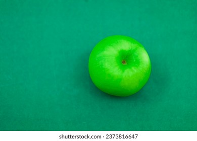 green apple with green background