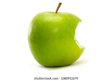 Green Apple With Bite Isolated Over A White Background.