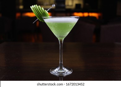 Green Apple Flavored Cocktail Mocktail With Apple Slices Side View Landscape