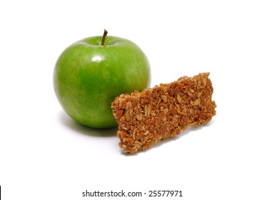 Green Apple And Granola Bar Isolated On A White Background