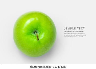 Green apple on white background Top view
