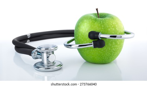 Green Apple With Stethoscope Isolated On White
