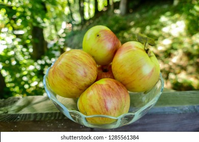 green apples in a basket,  