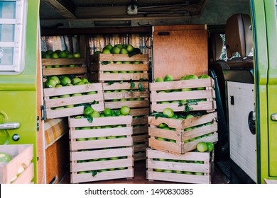 Green apples in the boxes. Apple harvest. Dietary nutrition. Fruitorianism. Healthy fruits. Natural source of vitamins. Car with apples. - Shutterstock ID 1490830385