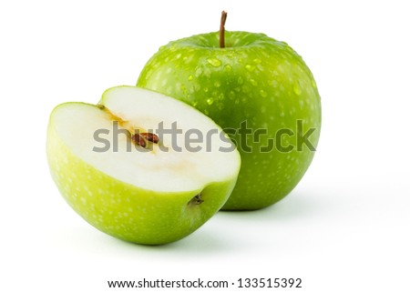Green apples Ganny Smith covered in water droplets isolated against a white background.