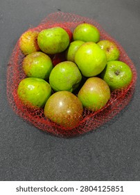 Green apples represent a high-value, nutrient-dense produce asset commonly associated with freshness, crisp texture, and a balanced tart flavor profile