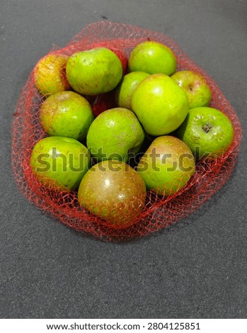 Green apples represent a high-value, nutrient-dense produce asset commonly associated with freshness, crisp texture, and a balanced tart flavor profile