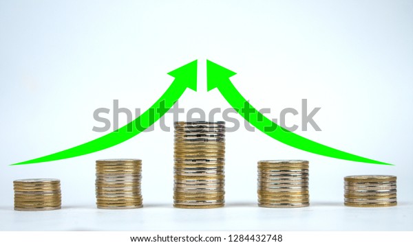 Green arrow and coin growth chart on a white\
background.\
Green arrow up graphics on a stack of coins. The\
concept of profit growth and\
indicators.