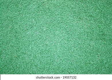 A Green Artificial Astro Turf Texture Commonly Used In Ball Sports.