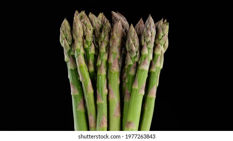 Green Asparagus Bunch Isolated On Black Background