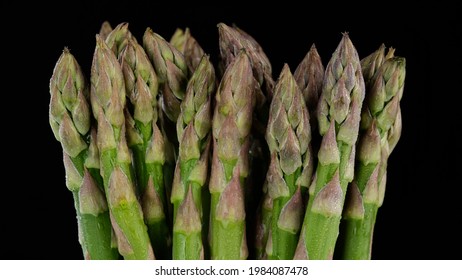 Green Asparagus Bunch Isolated On Black Background