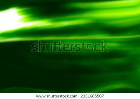 Green Aurora pattern texture with green glow on black background.   