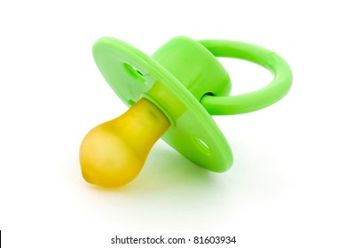 Green Baby's Dummy Isolated On White