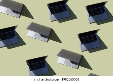 Green Background With Laptops. Technology Pattern, Computers, Internet, Remote Work Equipment