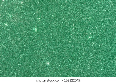 Green Background From Wrapping Paper With Glitter