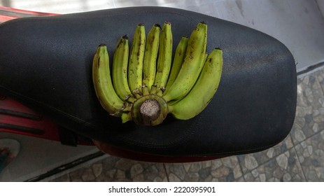 Green Banana On The Motorcycle Saddle