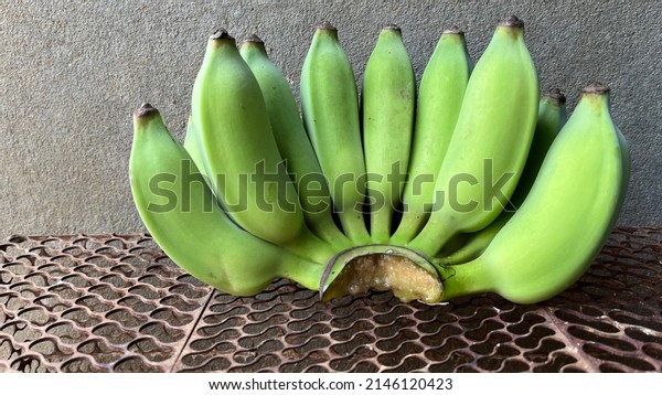 Green banana,\
Unripe bananas isolation\
background