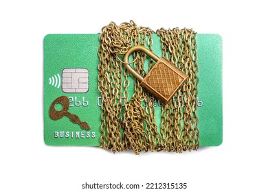 Green Bank Card Wrapped With Chain And Secured With A Padlock And A Key Isolated On A Neutral Background. Creative Credit Card Safety And Fraud Protection Concept.