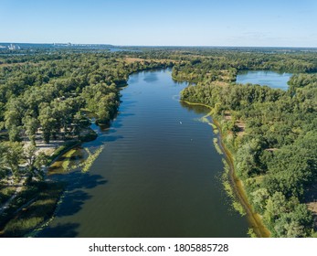 Green bank of the Dnieper river on a summer sunny day. Aerial drone view. - Shutterstock ID 1805885728